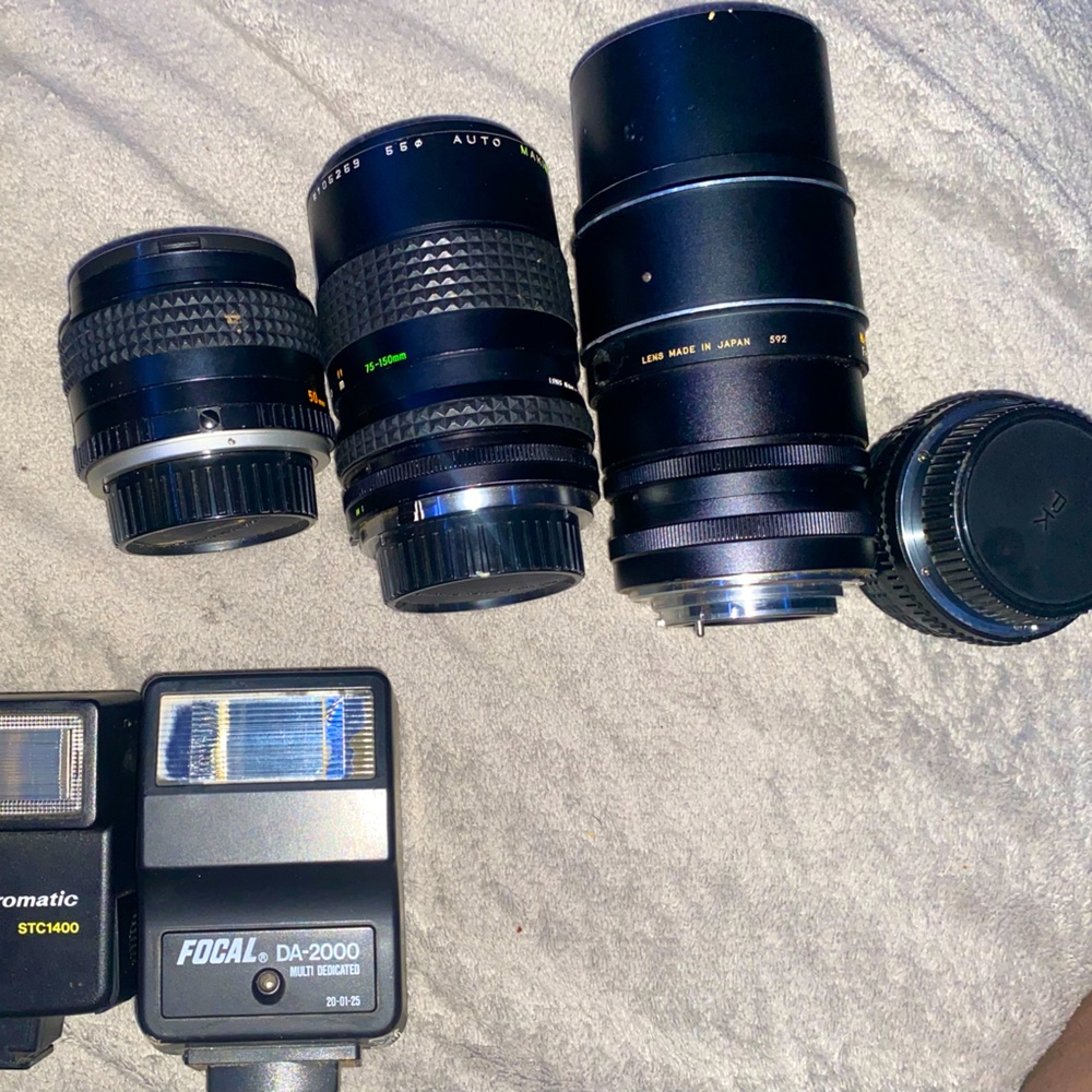 Minolta lenses, great zoom.